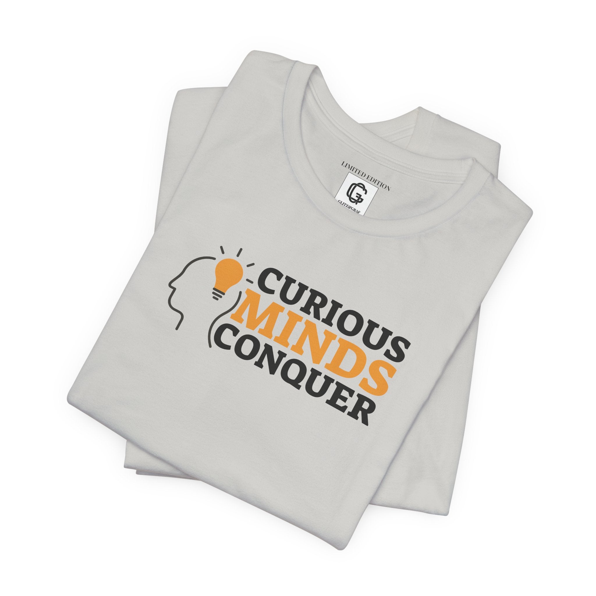 Curious Minds Conquer – Unisex Jersey Short Sleeve Tee