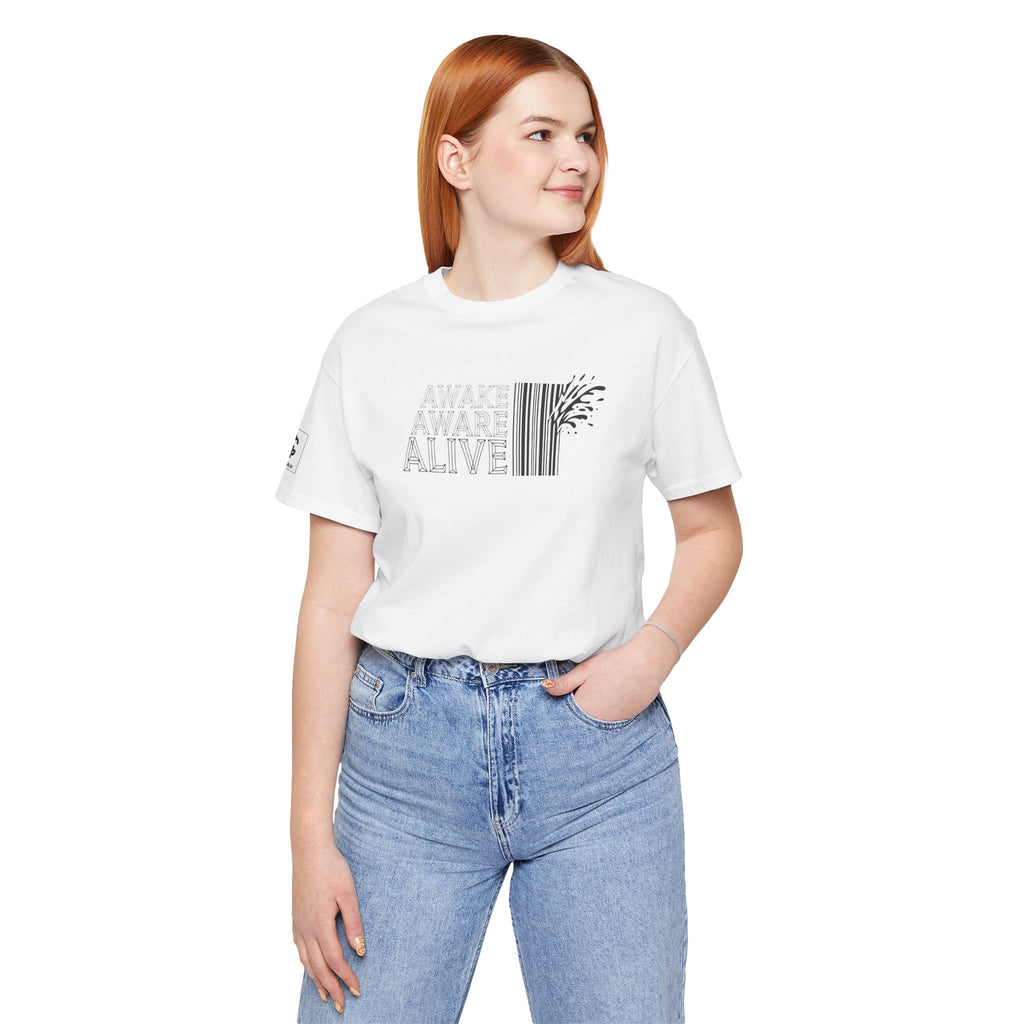 Woman wearing white t-shirt with “Awake Aware Alive” text design, minimalist graphic with barcode element, modern aesthetic